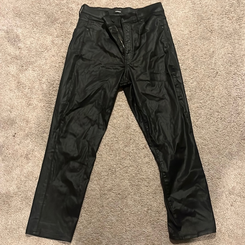 Express stretch coated black super high rise straight jeans.